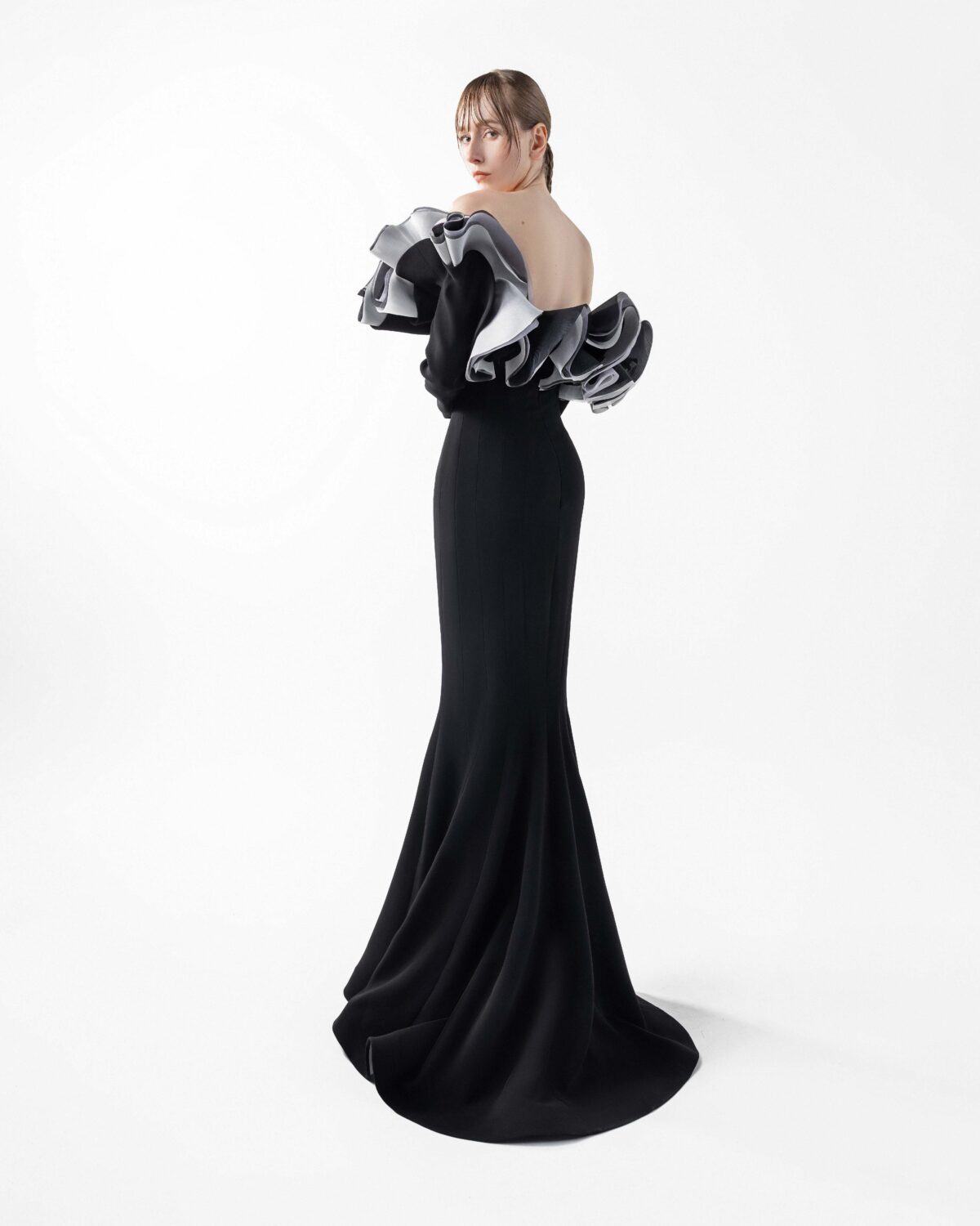 Romantic Black Gown with Sculptural Ruffles and Sleeves